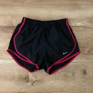 Black and pink nike shorts